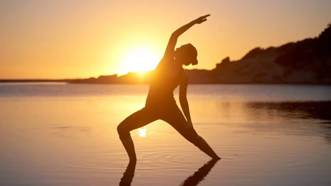 Kiss the Sun Rays: The Mind & Body Benefits of Sunrise Yoga